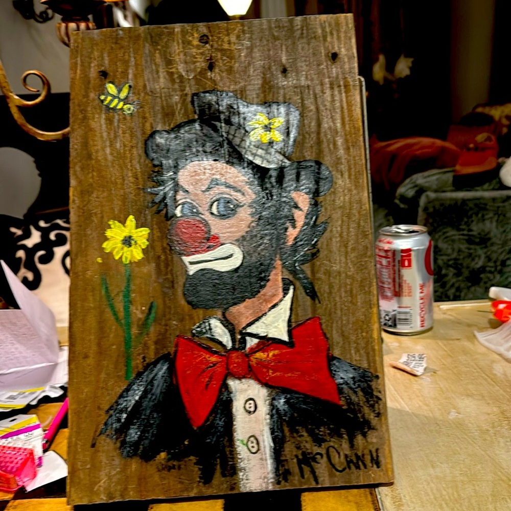 Paining of clown on wood